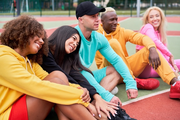 Multi-ethnic group people teenage friends. African-american, asian, caucasian student spending time together Multiracial friendship