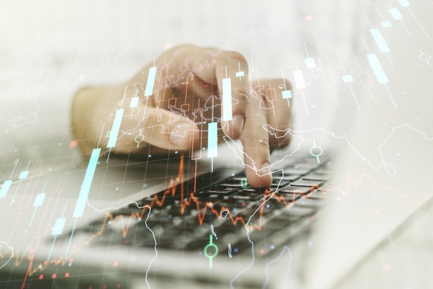 Multi exposure of abstract creative financial chart with world map and with hand typing on computer keyboard on background research and analytics concept