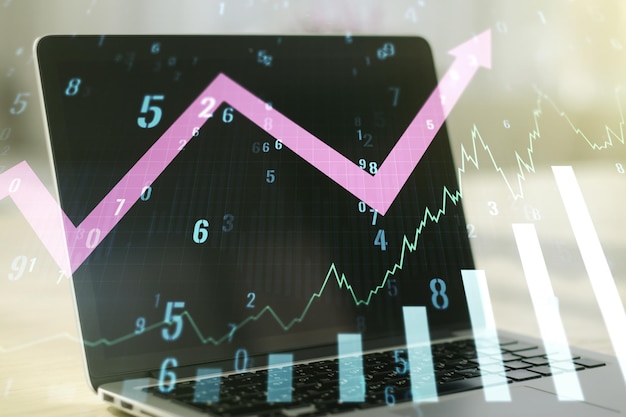 Multi exposure of abstract creative financial graph with upward arrow on modern laptop background forex and investment concept