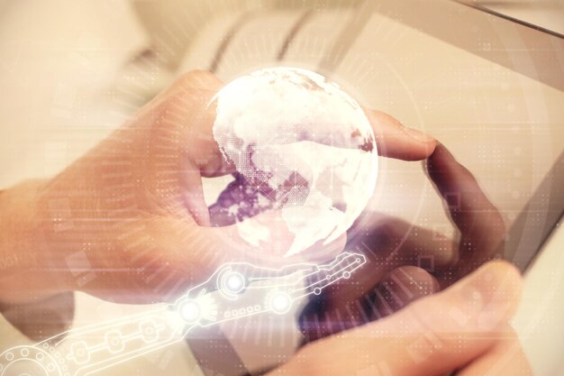 Photo multi exposure of man's hands holding and using a digital device and map drawing international business concept