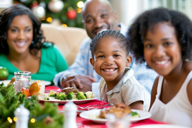 Multi generation family sitting at table having christmas dinner