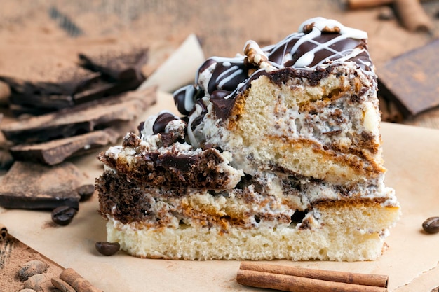 A multi-layered cake made of chocolate and cream cakes