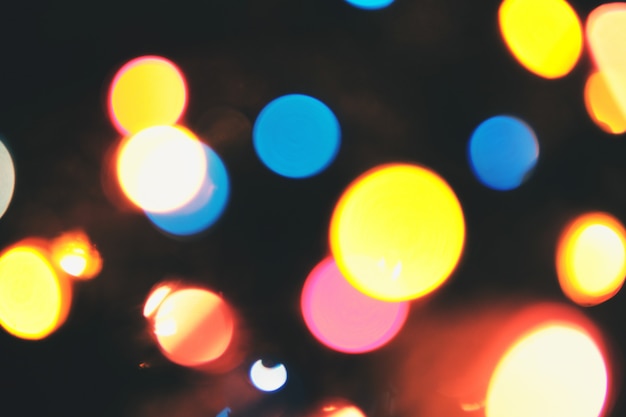 Multicolor bokeh background with defocused lights.