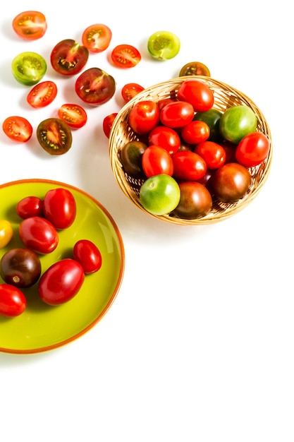 Multicolored cherry tomatoes picked from organic garden.