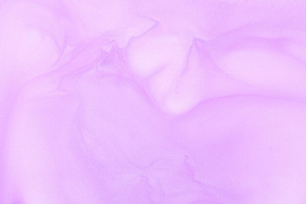 Multicolored creative abstract background Lilac alcohol ink Waves stains spots and strokes of paint marble texture