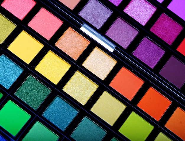 Multicolored eye shadows close up