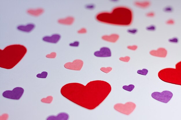 multicolored hearts on a white background. Background for Valentine's Day