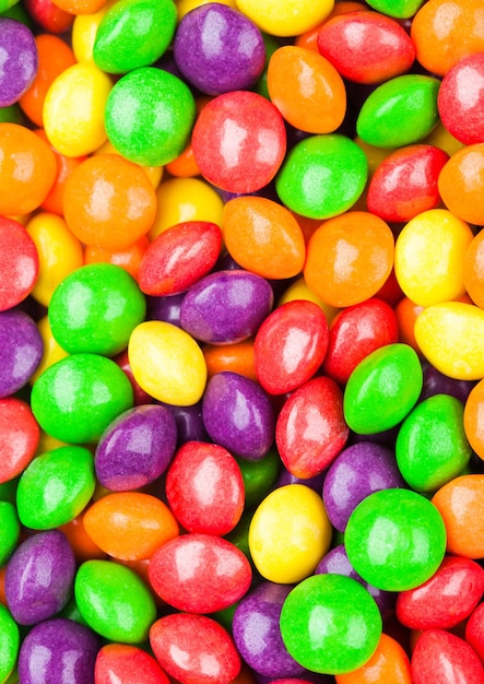 Multicolored mix of fruit candies to use as background Macro