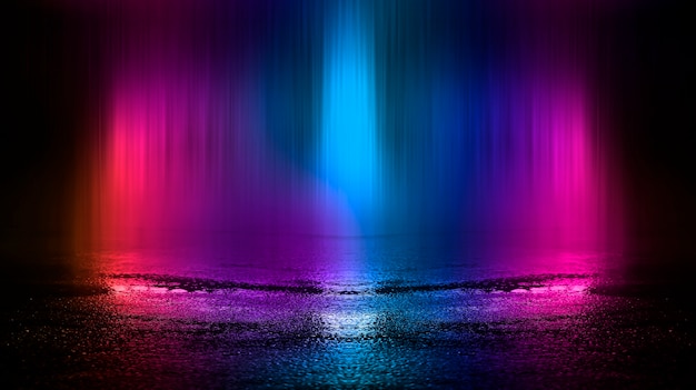 Multicolored neon lights on a dark city street reflection of neon light in puddles and water abstract night background