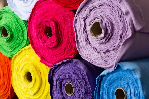 Multicolored rolls with knitted fabric close-up