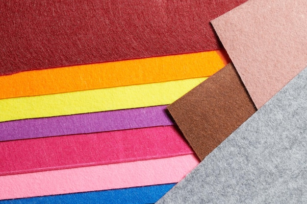 Multicolored soft felt textile material colorful patchwork texture fabric closeup