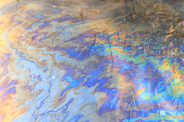 multicolored spot gasoline abstract background, abstract oil spill on water