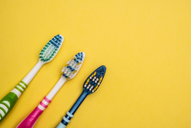 Multicolored toothbrushes. copy space.