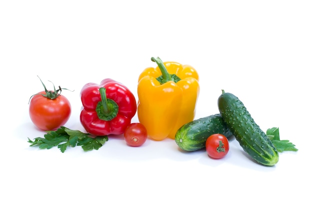 Multicolored vegetables on a white background