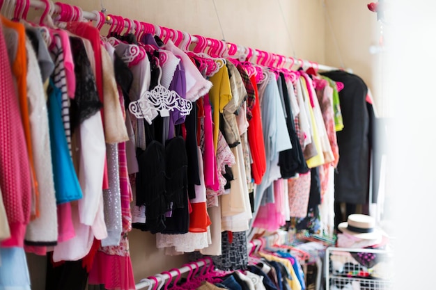 Multicoloured wardrobe in woman room