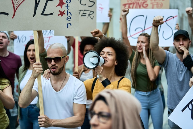 Multiethnic group of people protesting against racial discrimination on the streets