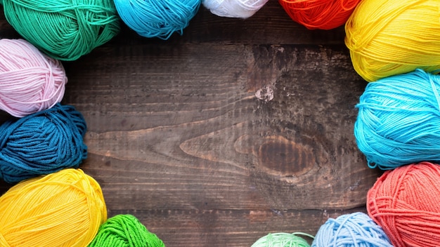 Multiple colored balls of yarn. Top view