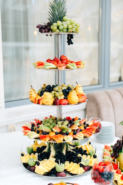 Multiple fruits on stand in restaurant