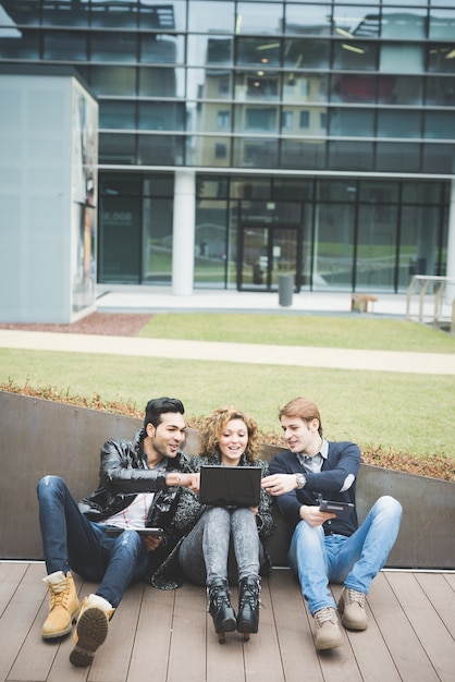 Multiracial business people working outdoor in town