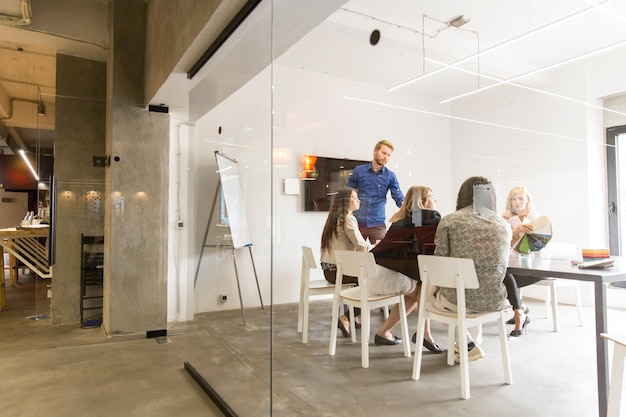 Multiracial modern business team developing the company's strategy at the office