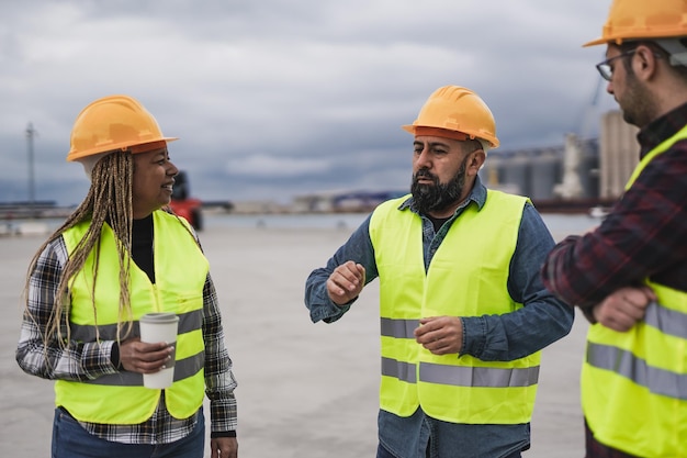 Multiracial people working at industrial harbor Concept of dock worker