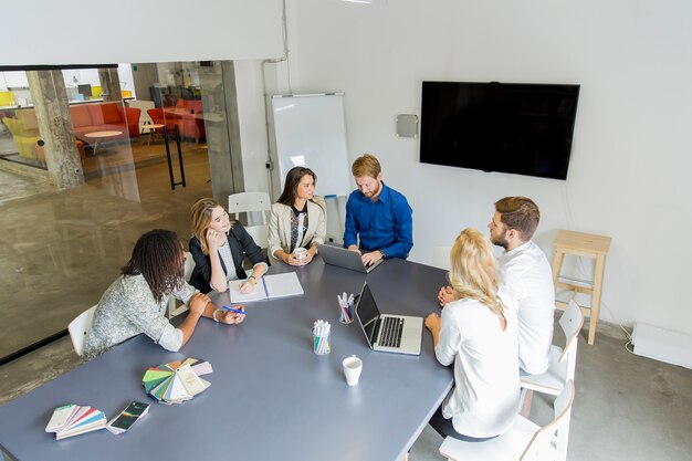 Multiracial young business people working in office