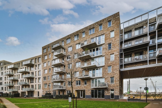 Multistorey residential building with green ufpjyjv at the house