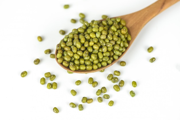 Mung beans on wooden spoon 