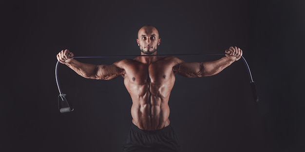 Muscular man exercising doing sit up exercise athlete with six pack white male no shirt