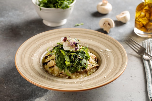 Mushroom Risotto served in dish isolated on table top view of arabic breakfast