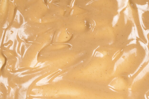 Mushroom sauce as a background. Top view.