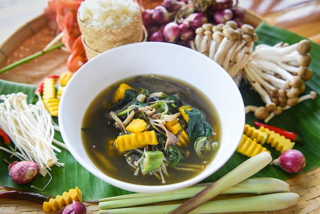 Mushroom soup herbs and spices ingredients Thai food served on bowl Mix various kinds of mushrooms tradition northeast food Isaan.