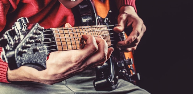 Musical instrument Electric guitar Repetition of rock music band Music festival Man playing guitar Close up hand playing guitar Musician playing guitar live music