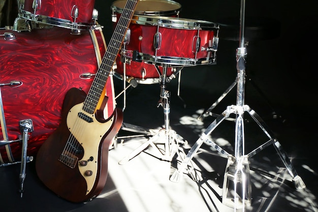 Musical instruments on a stage on dark background