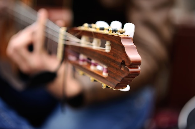 Musician playing the guitar on the street