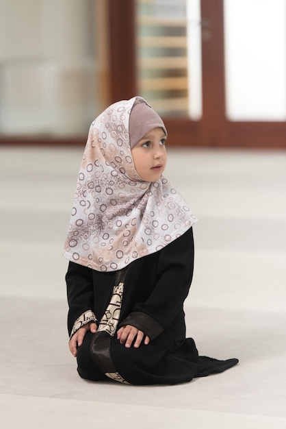 Muslim Girl Is Praying In The Mosque