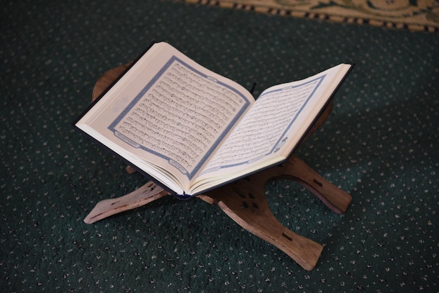 muslim people in mosque reading quran together concept of islamic education