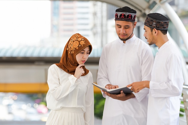 Muslim teen group reading book