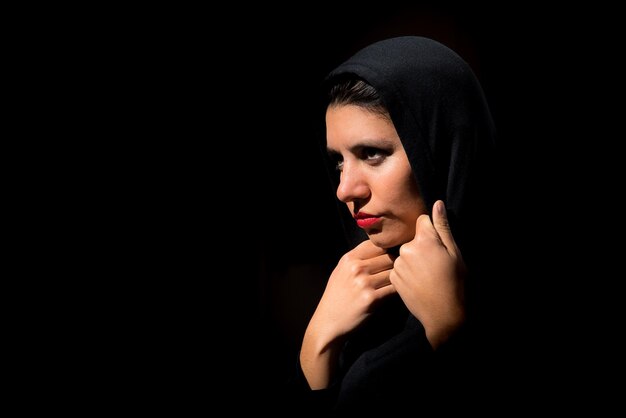 Muslim woman in the dark mysterious gaze