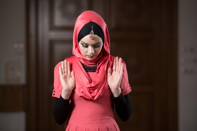 Muslim Woman Is Praying In The Mosque