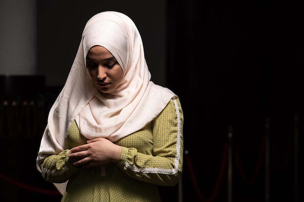 Muslim Woman Praying at the Mosque