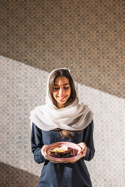 Muslim woman with dates