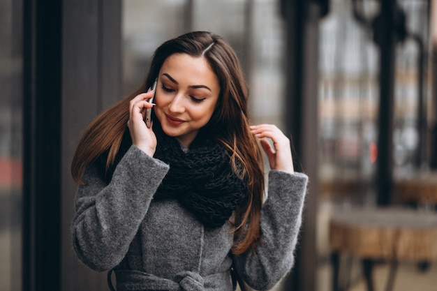 Muslim woman with phone