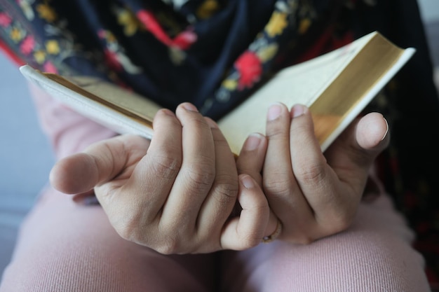 Muslim women39s hand reading quran