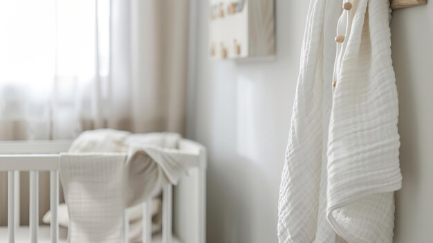 Photo muslin baby blanket hanging on childs bed in nursing room generative ai