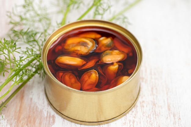 Mussels in small iron box closeup