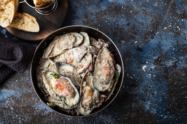 Mussels with Blue Cheese Sauce and Garlic Baguette.