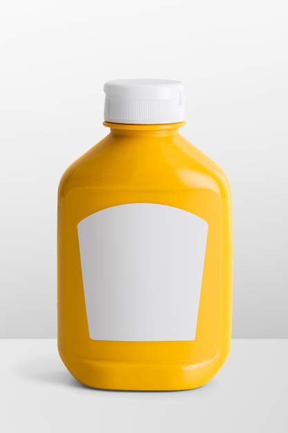 Mustard in yellow plastic bottle