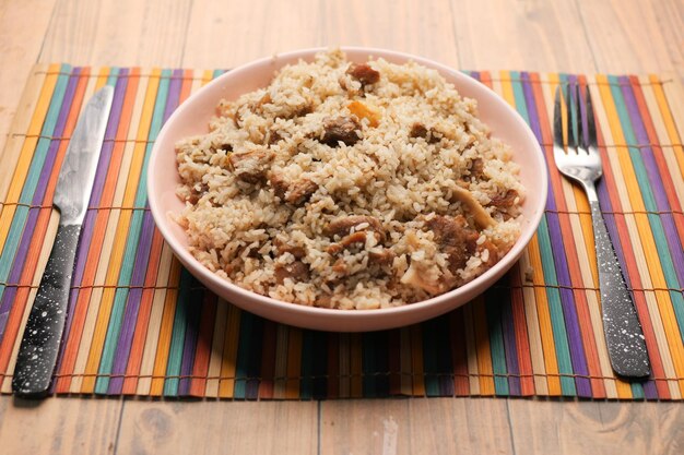 Mutton biryani meal in a plate on table