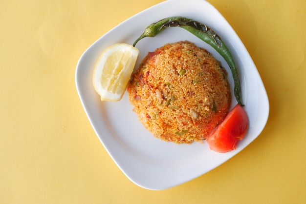 Mutton biryani meal in a plate on table